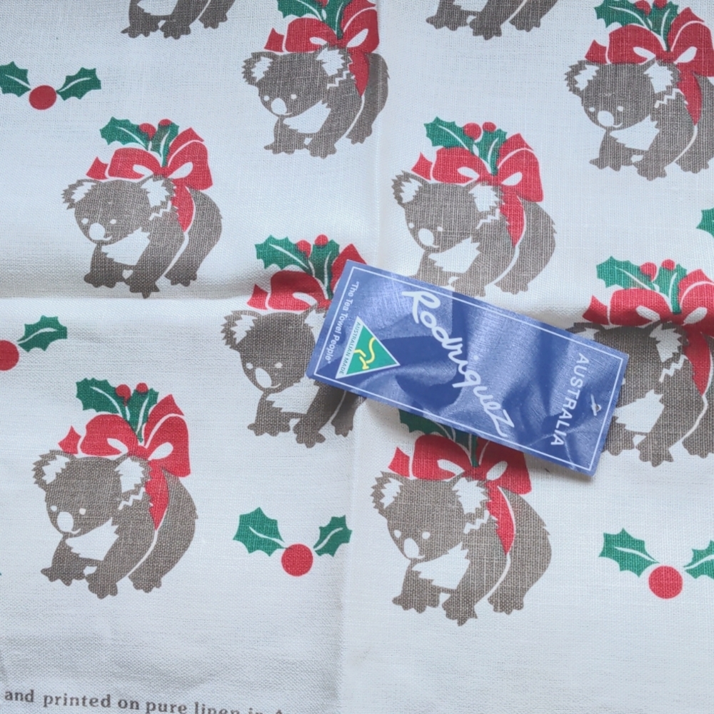 Linen tea towel by Rodriquez. Holiday Koalas